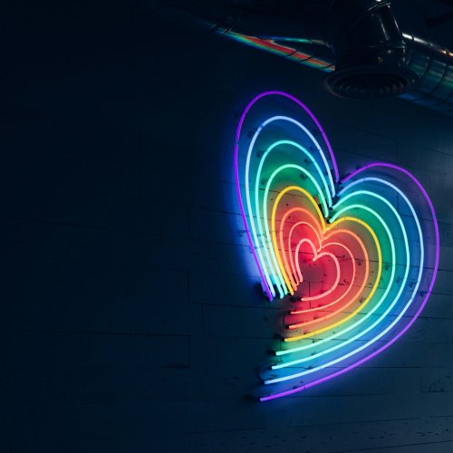 A rainbow neon heart